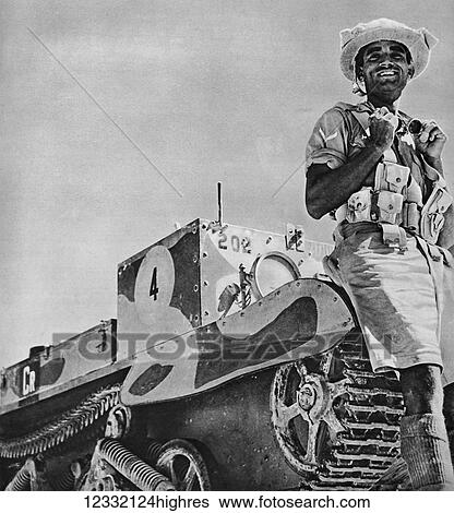 Stock Photograph - The Illustrated London News 1941. World war II. Indias important aprt in the Libya Battles. A typical soldier by his bren carier.. Fotosearch
