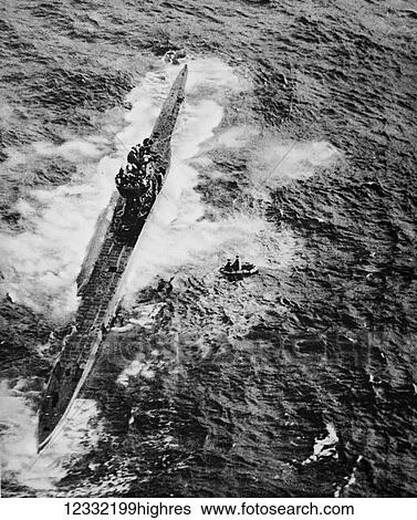 Stock Photograph - The Illustrated London News 1941. World war II. A U boat surrenders to a coastal command Hudson Aircraft after being machine gunned.. Fotosearch