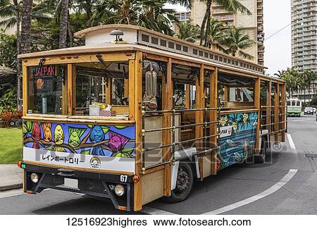 Stock Photograph - The Jalpak name and logo as seen on this Waikiki trolley rolling down Ala Moana Boulevard, a provider for Japanese tourists, Waikiki; Honolulu, Oahu, Hawaii, United States of America. Fotosearch