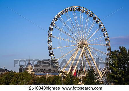 Stock Photograph - The Montreal Observation Wheel in the Old Port of Montreal; Montreal, Quebec, Canada. Fotosearch