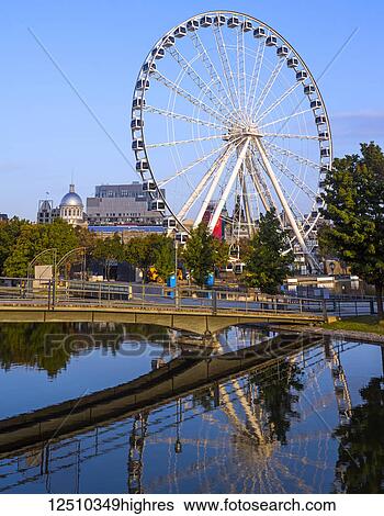 Stock Photograph - The Montreal Observation Wheel in the Old Port of Montreal; Montreal, Quebec, Canada. Fotosearch