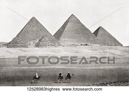 Stock Photograph - The pyramids of Giza, Giza Plateau, Cairo, Egypt. The Great Pyramid of Giza aka the Pyramid of Cheops or Khufu, Pyramid of Khafre aka Chephren and the Pyramid of Menkaure aka Mykerinos. From The Wonders of the World, published c. 1920.. Fotosearch