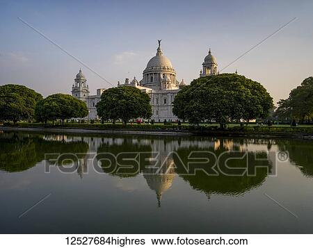 Stock Photograph - The Victoria Memorial, dedicated to the memory of Queen Victoria; Kolkata, West Bengal, India. Fotosearch