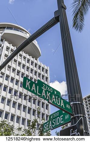 The Waikiki Busines Plaza towers over Waikiki near the intersection of Kalakaua and Seaside avenues; Honolulu, Oahu, Hawaii, United States of America View Large Photo Image Stock Photograph - The Waikiki Busines Plaza towers over Waikiki near the intersection of Kalakaua and Seaside avenues; Honolulu, Oahu, Hawaii, United States of America. Fotosearch