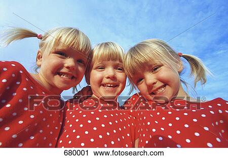 Stock Image - Three little girls. Fotosearch