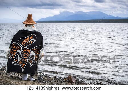 Tlingit first nation woman in traditional wardrobe on the shores of Teslin Lake; Teslin, Yukon, Canada View Large Photo Image Stock Photograph - Tlingit first nation woman in traditional wardrobe on the shores of Teslin Lake; Teslin, Yukon, Canada. Fotosearch