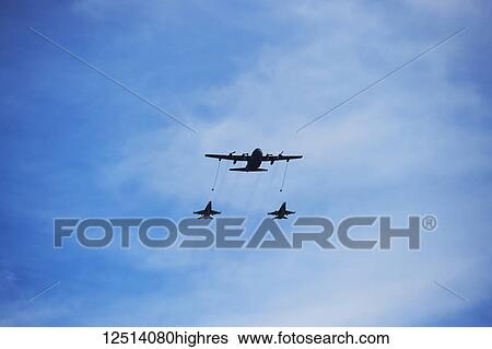 Stock Photograph - Toronto Airshow 2017, inflight re-fuel, downtown Toronto; Toronto, Ontario, Canada. Fotosearch