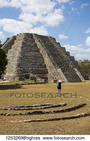 Tourist taking pictures at Castle of Kululcan, Mayapan Archaeological Site, Mayan Ruins; Yucatan, Mexico View Large Photo Image Stock Photograph - Tourist taking pictures at Castle of Kululcan, Mayapan Archaeological Site, Mayan Ruins; Yucatan, Mexico. Fotosearch