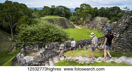 Tourists at the ruins in a Mayan village; San Jose Succotz, Cayo District, Belize View Large Photo Image Stock Photograph - Tourists at the ruins in a Mayan village; San Jose Succotz, Cayo District, Belize. Fotosearch