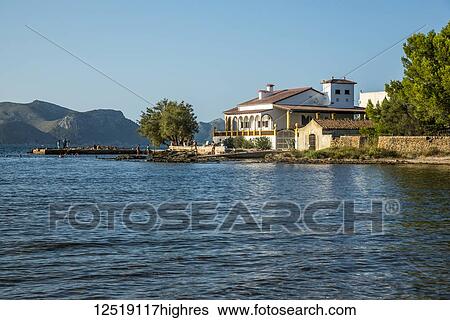 Stock Photograph - Tourists enjoying the Mediterranean Sea during their holiday near Alcudia; Mallorca, Balearic Islands, Spain. Fotosearch