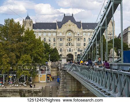 Tourists on the Chain Bridge over the Danube River; Budapest, Budapest, Hungary View Large Photo Image Stock Photograph - Tourists on the Chain Bridge over the Danube River; Budapest, Budapest, Hungary. Fotosearch