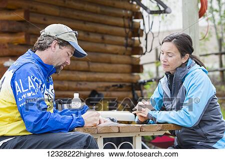 Two People Participating In A Paragliding Instruction Class, Alaska, USA View Large Photo Image Stock Photograph - Two People Participating In A Paragliding Instruction Class, Alaska, USA. Fotosearch