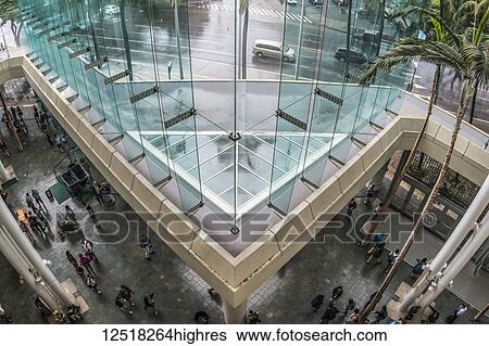 Stock Photograph - Upper level overview of the Hawaii Convention Center foyer, Waikiki; Honolulu, Oahu, Hawaii, United States of America. Fotosearch