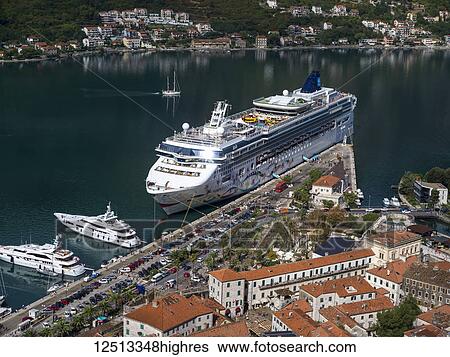 Stock Photograph - View from Kotor Fortress with a cruise ship in the harbour; Kotor, Monte. Fotosearch