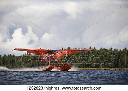 View Of A Cessna 206 Stationair Floatplane Landing, Alaska, USA View Large Photo Image Stock Photograph - View Of A Cessna 206 Stationair Floatplane Landing, Alaska, USA. Fotosearch