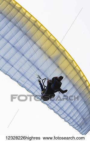 View Of Paraglider Overhead, Alaska, USA View Large Photo Image Stock Photograph - View Of Paraglider Overhead, Alaska, USA. Fotosearch