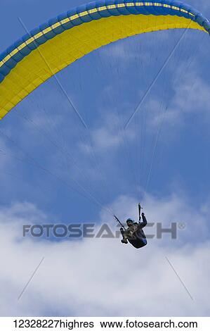 View Of Paraglider Overhead, Alaska, USA View Large Photo Image Stock Photograph - View Of Paraglider Overhead, Alaska, USA. Fotosearch