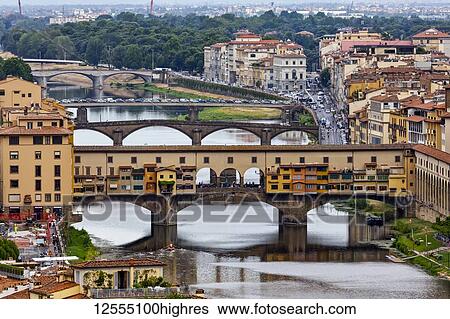 Stock Photograph - View of the River Arno in Florence, including the Ponte Vecchio; Florence, Italy. Fotosearch