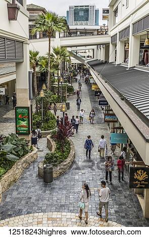 Stock Photograph - View within the Ala Moana Shopping Center, an open air shopping area depicting its multi-leveled and tropic nature, Waikiki; Honolulu, Oahu, Hawaii, United States of America. Fotosearch