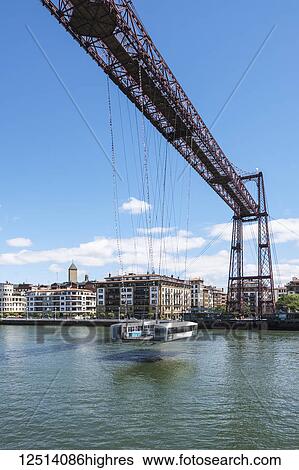 Stock Photograph - Vizcaya Bridge, the first mechanical transporter bridge in the world, viewed from Portugalete side; Portugalete, Vizcaya, Pais Vasco, Spain. Fotosearch