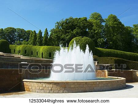 Stock Photograph - Volcane pool erupting at the front end of the Grand Cascade in The Alnwick Garden; 0rthumberland, England. Fotosearch