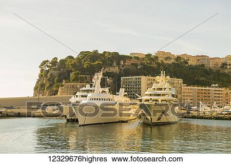 Waterfront With Buildings And Yachts In The Harbour; Monte Carlo, Monaco View Large Photo Image Stock Photograph - Waterfront With Buildings And Yachts In The Harbour; Monte Carlo, Monaco. Fotosearch