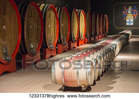 Wine Barrels Of Different Sizes At Ciacci Piccolomini D'aragona Vineyard; Italy View Large Photo Image Stock Photograph - Wine Barrels Of Different Sizes At Ciacci Piccolomini D'aragona Vineyard; Italy. Fotosearch