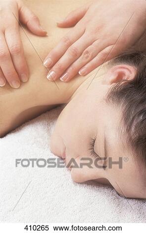 Woman getting a massage View Large Photo Image Stock Photography - Woman getting a massage. Fotosearch