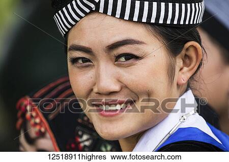 Stock Photograph - Woman in traditional costume, Plain of Jars; Xiangkhouang, Laos. Fotosearch