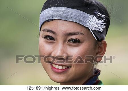 Stock Photograph - Woman in traditional costume, Plain of Jars; Xiangkhouang, Laos. Fotosearch