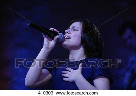 Woman singing View Large Photo Image Stock Image - Woman singing. Fotosearch
