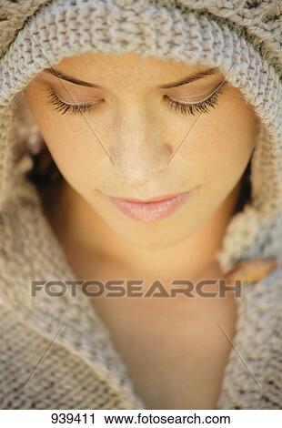 Woman wearing a knit hood View Large Photo Image Stock Image - Woman wearing a knit hood. Fotosearch