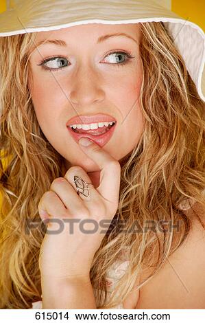Woman wearing hat and ring View Large Photo Image Picture - Woman wearing hat and ring. Fotosearch