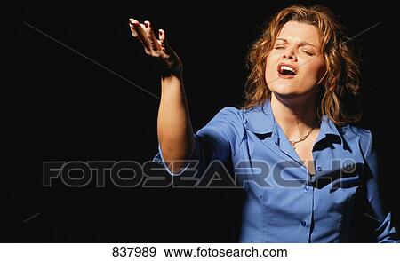 Woman worshipping View Large Photo Image Stock Photo - Woman worshipping. Fotosearch
