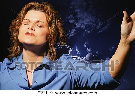 Woman worshipping View Large Photo Image Stock Photo - Woman worshipping. Fotosearch