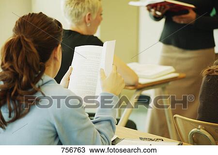 Stock Image - Working in class. Fotosearch