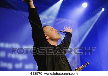 Worship leader raising hands View Large Photo Image Stock Image - Worship leader raising hands. Fotosearch