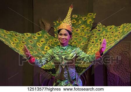 Young woman performing the Pailin Peacock Dance in a Khmer classical dance performance; Siem Reap, Cambodia View Large Photo Image Stock Photograph - Young woman performing the Pailin Peacock Dance in a Khmer classical dance performance; Siem Reap, Cambodia. Fotosearch