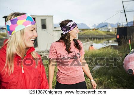 Young women hanging out along coastal Homer, South-central Alaska, USA View Large Photo Image Stock Photograph - Young women hanging out along coastal Homer, South-central Alaska, USA. Fotosearch