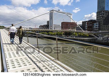 Stock Photograph - Zubizuri Bridge over River Nervion; Bilbao, Vizcaya, Pais Vasco, Spain. Fotosearch