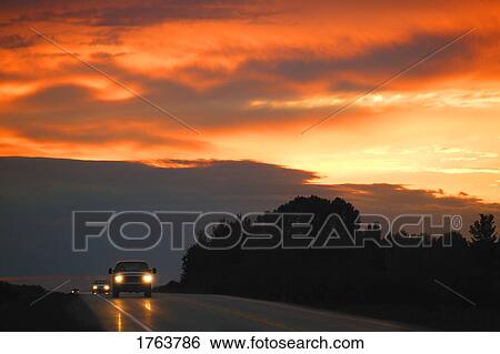 A highway sunset View Large Photo Image Stock Photograph - A highway sunset. Fotosearch