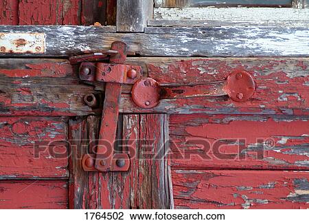 Stock Image - A lock on a barn door. Fotosearch