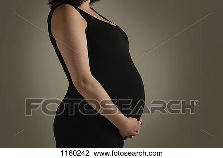 A pregnant woman View Large Photo Image Stock Image - A pregnant woman. Fotosearch