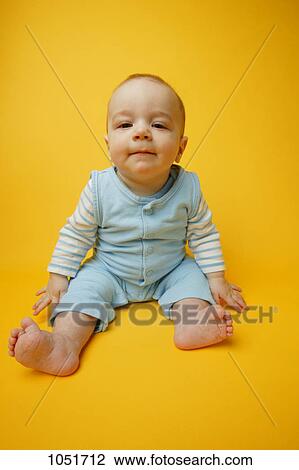 Stock Image - Baby in wonder. Fotosearch