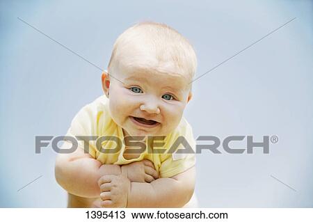 Stock Image - Baby smiles. Fotosearch