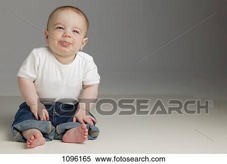 Stock Photography - Baby spits. Fotosearch