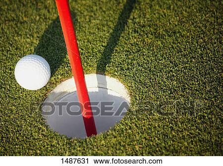 Stock Image - Ball close to the pin. Fotosearch
