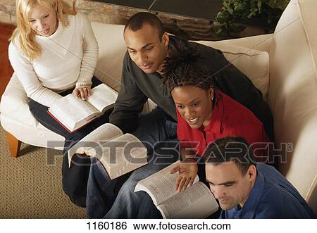 Bible study in progress View Large Photo Image Stock Photograph - Bible study in progress. Fotosearch
