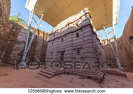 Stock Photograph - Biete Amanuel (House of Immanuel) Ethiopian Orthodox rock-cut church in the Southern Group of the Rock-Hewn Churches; Lalibela, Amhara Region, Ethiopia. Fotosearch