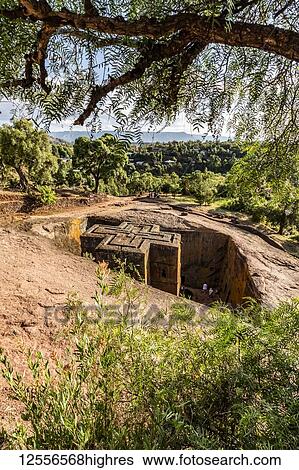Stock Photograph - Biete Ghiorgis (House of Saint George) Ethiopian Orthodox underground monolith rock-cut church in the Northern Group of the Rock-Hewn Churches; Lalibela, Amhara Region, Ethiopia. Fotosearch